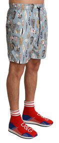 Load image into Gallery viewer, Dolce & Gabbana Elegant swimming trunks with a seashell print
