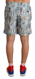 Load image into Gallery viewer, Dolce & Gabbana Elegant swimming trunks with a seashell print
