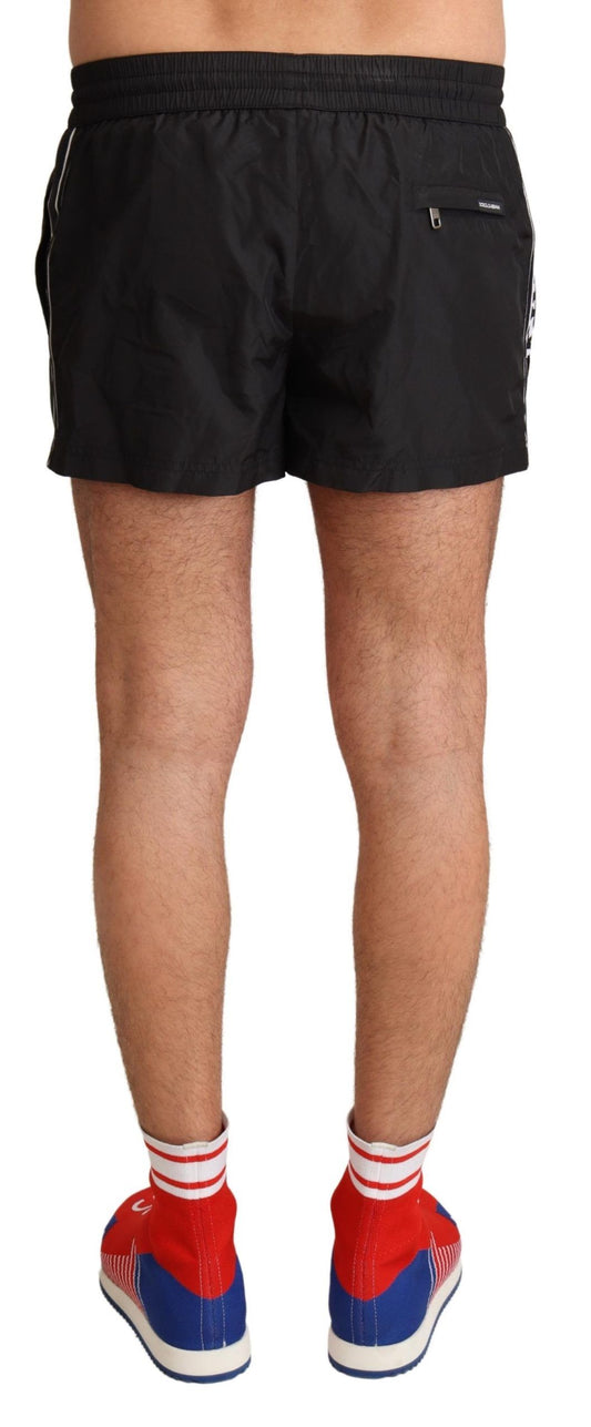 Dolce &amp; Gabbana Elegant black KING motif swimming trunks