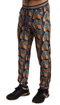 Load image into Gallery viewer, Dolce & Gabbana Elegant silk jogging pants with a vibrant print
