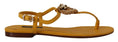 Load image into Gallery viewer, Dolce & Gabbana Senfgelbe flache Sandalen mit T-Riemen und Herz-Verzierung
