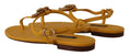 Load image into Gallery viewer, Dolce & Gabbana Senfgelbe flache Sandalen mit T-Riemen und Herz-Verzierung
