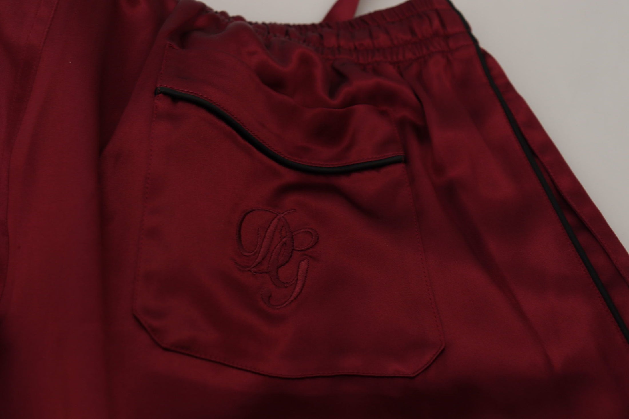 Dolce &amp; Gabbana silk lounge pants in burgundy