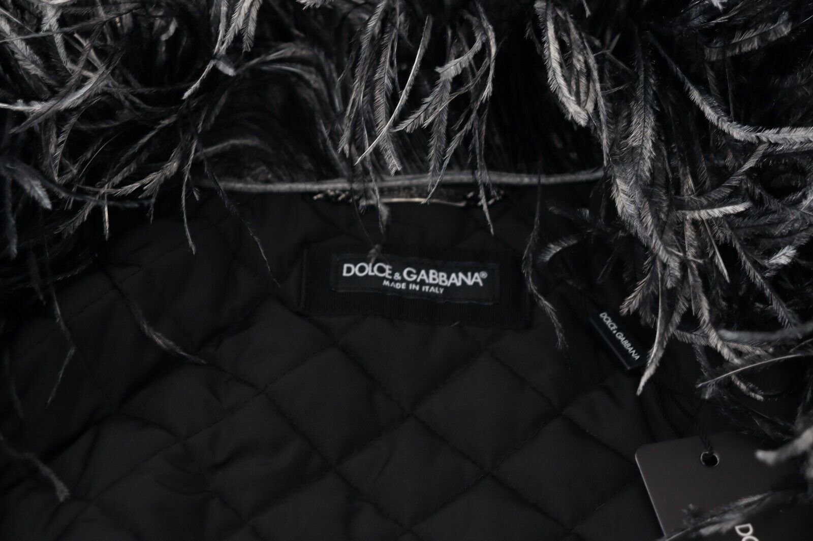 Dolce & Gabbana Elegante Jacke mit Reißverschluss aus Shearling in Schwarz und Weiß