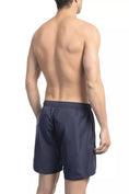 Load image into Gallery viewer, Bikkembergs Chic blue swimming shorts with a fashionable front print
