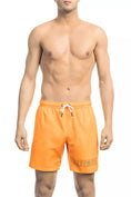 Load image into Gallery viewer, Bikkembergs Electric Orange swim shorts with iconic print
