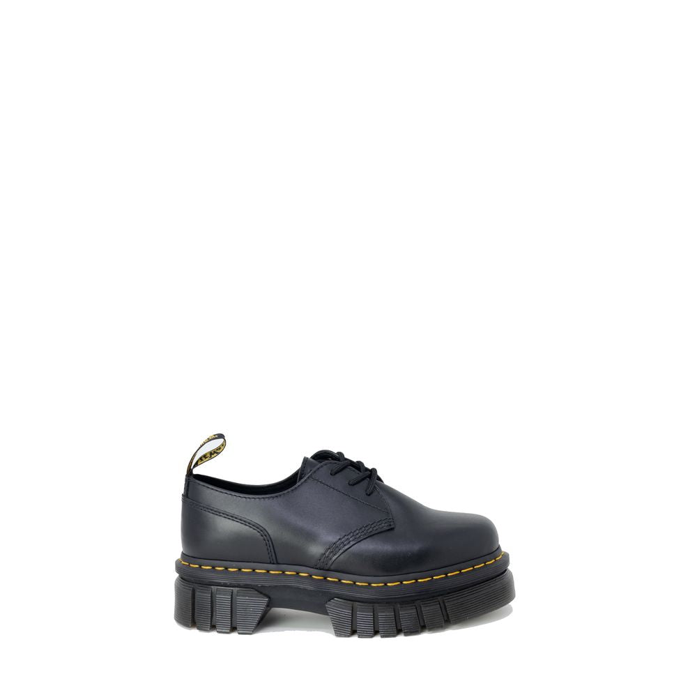 Dr. Martens Flacher Schuh aus schwarzem Leder