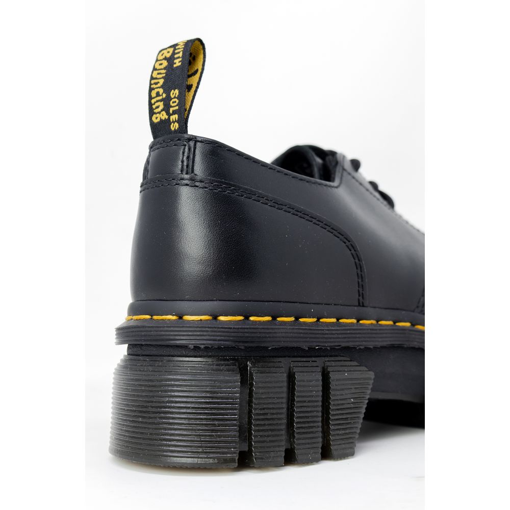 Dr. Martens Flacher Schuh aus schwarzem Leder