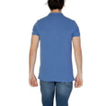 Load image into Gallery viewer, Tommy Hilfiger Jeans Blaues Baumwoll-Poloshirt
