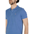 Load image into Gallery viewer, Tommy Hilfiger Jeans Blaues Baumwoll-Poloshirt
